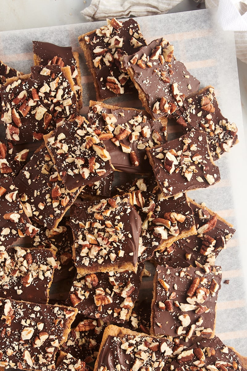 graham cracker toffee piled on a sheet of parchment paper