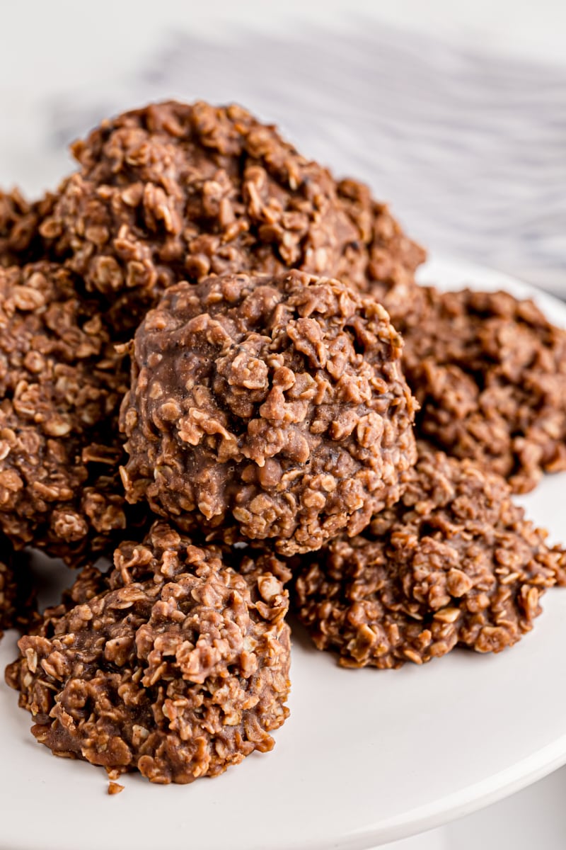 Pile of no-bake chocolate oatmeal cookies on plate