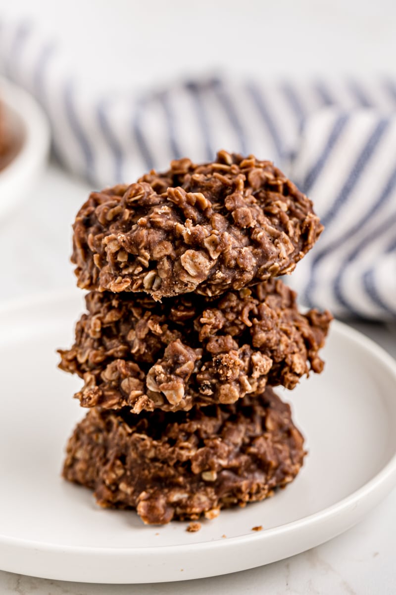 Stack of 3 no-bake chocolate oatmeal cookies on plate