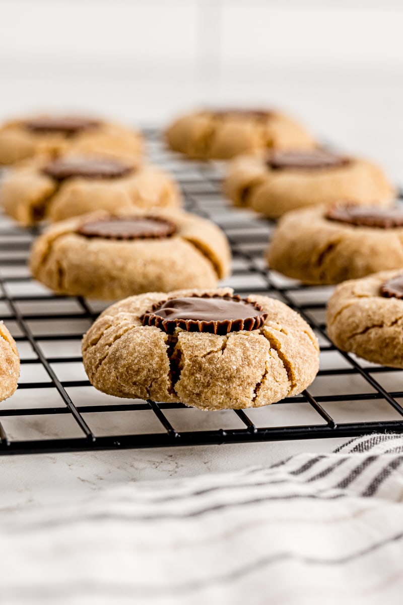 Wire rack of peanut butter cup cookies