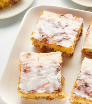 Squares of honey bun cake on platter