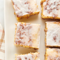 Overhead view of honey bun cake slices on platter