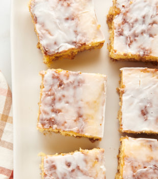 Overhead view of honey bun cake slices on platter