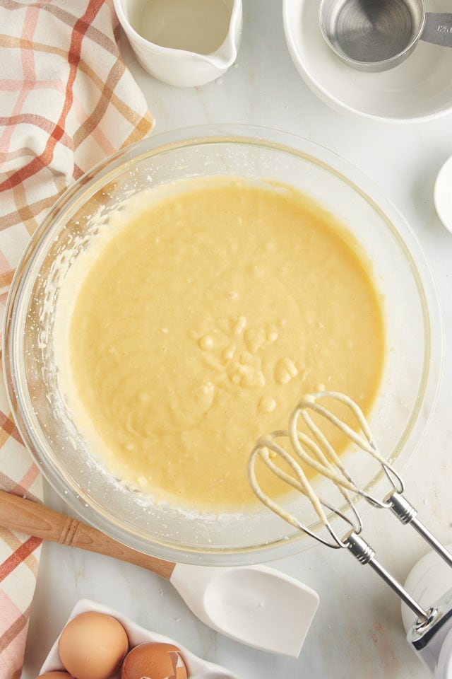 Overhead view of cake batter in mixing bowl