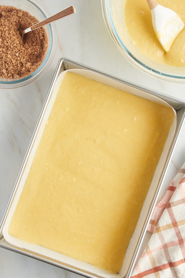 Overhead view of yellow cake batter in pan