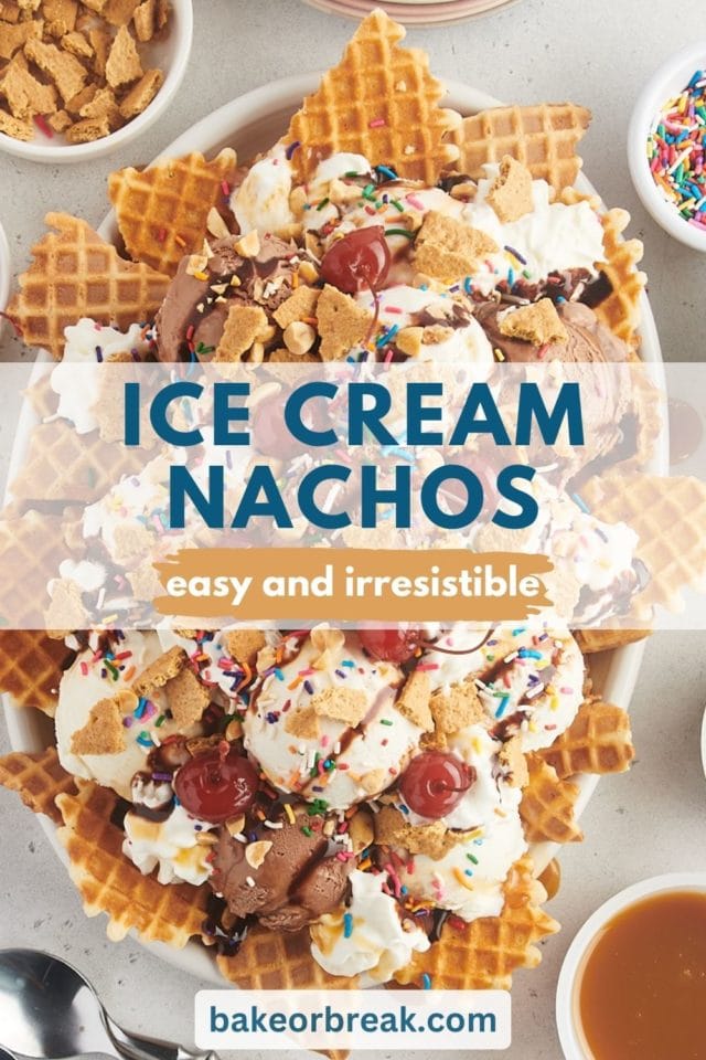 a large white oval platter filled with ice cream nachos; text overlay "ice cream nachos easy and irresistible bakeorbreak.com"