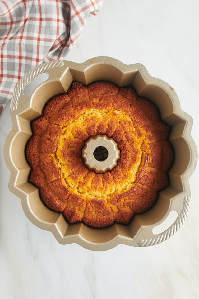 overhead view of freshly baked orange pound cake in a Bundt pan