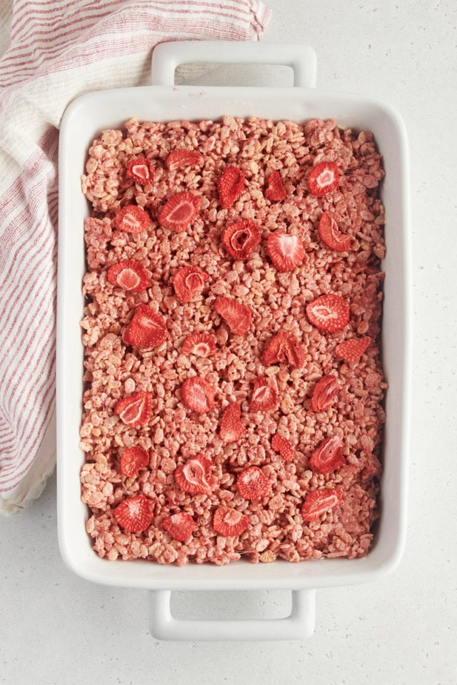 overhead view of strawberry rice crispy treats topped with freeze-dried strawberries