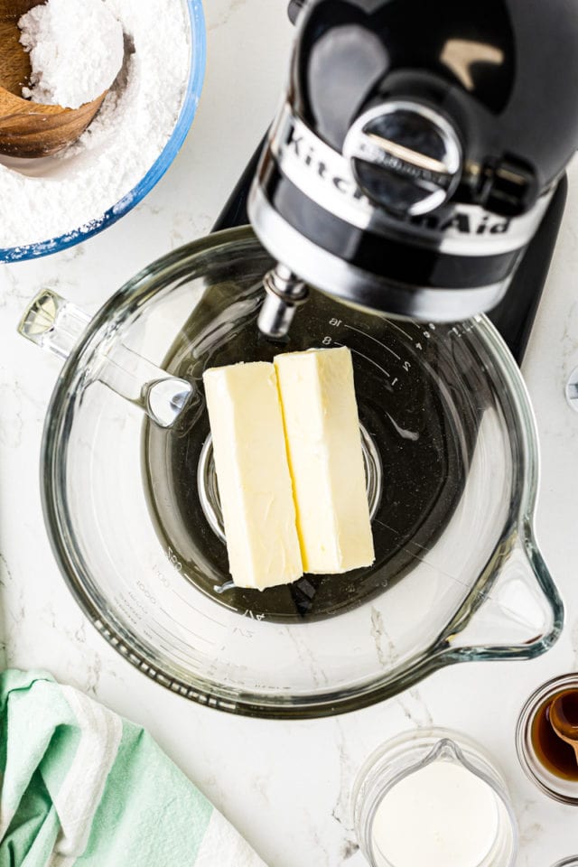 overhead view of butter in the bowl of a stand mixer