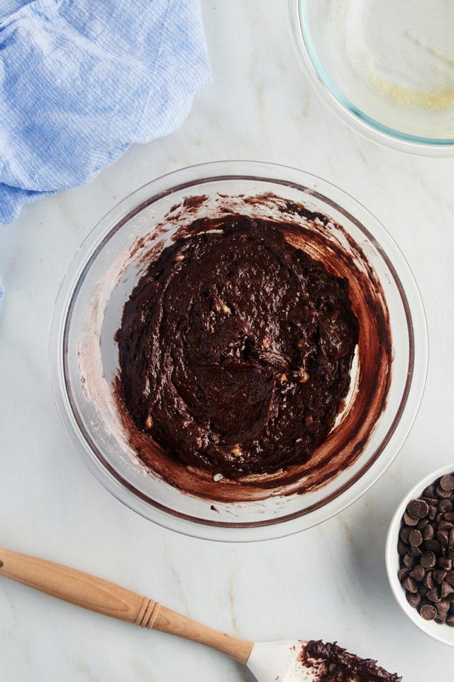 Overhead view of chocolate muffin batter in bowl
