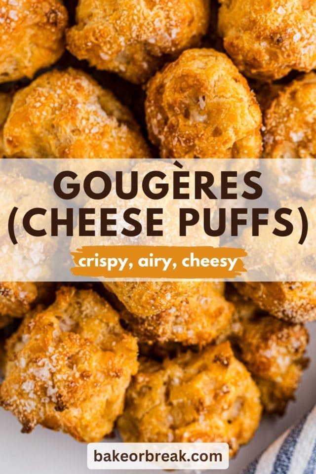 gougères piled on a white plate; text overlay "gougères (cheese puffs) crispy, airy, cheesy bakeorbreak.com