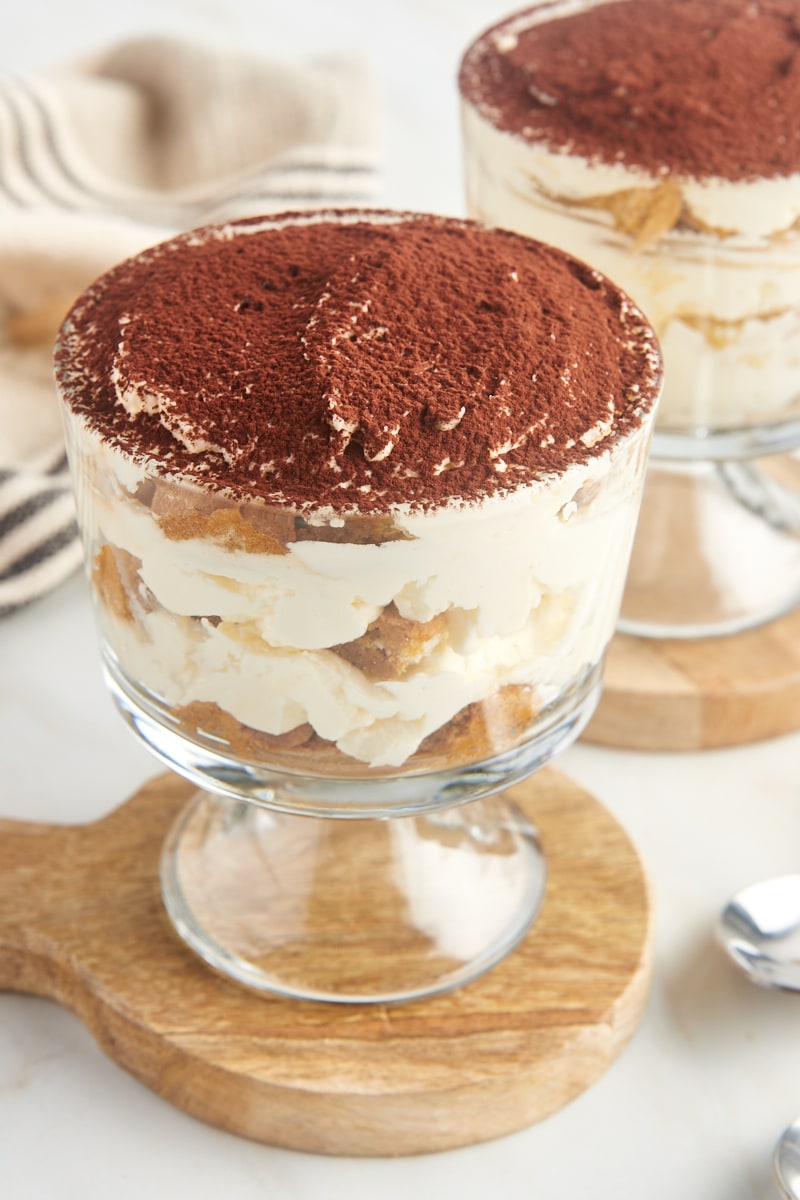 individual servings of tiramisu for two in footed glass bowls