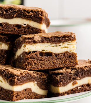 Side view of Irish cream brownies on plate, showing layers