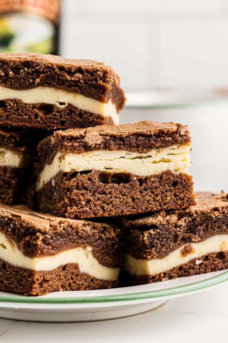 Side view of Irish cream brownies on plate, showing layers
