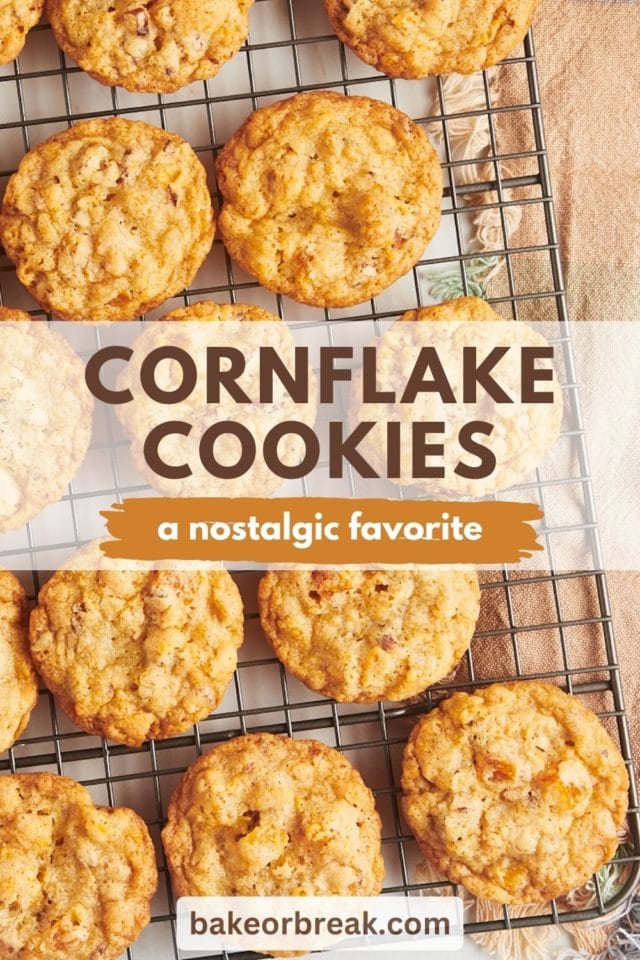 overhead view of cornflake cookies cooling on a wire rack; text overlay "cornflake cookies a nostalgic favorite bakeorbreak.com"