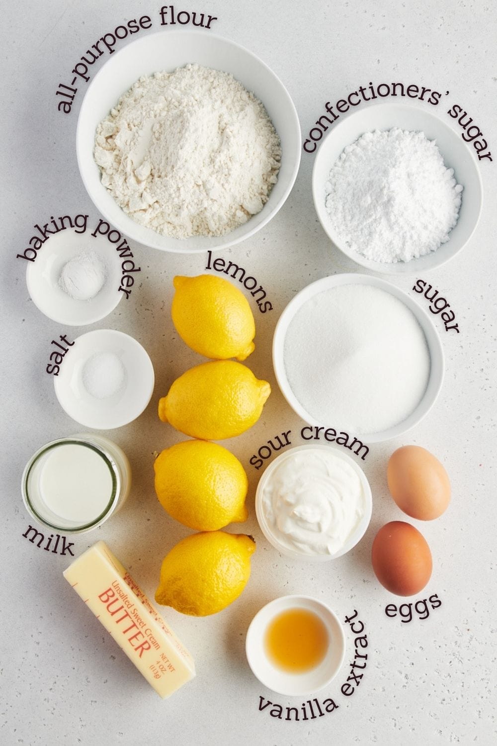 Overhead view of ingredients for lemon loaf cake with labels