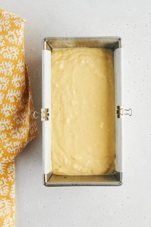 Overhead view of lemon loaf cake batter in pan