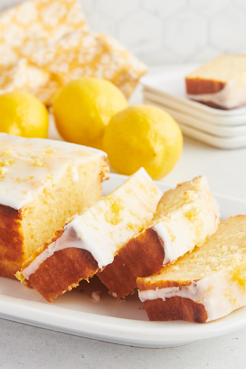 Sliced lemon loaf cake on serving platter