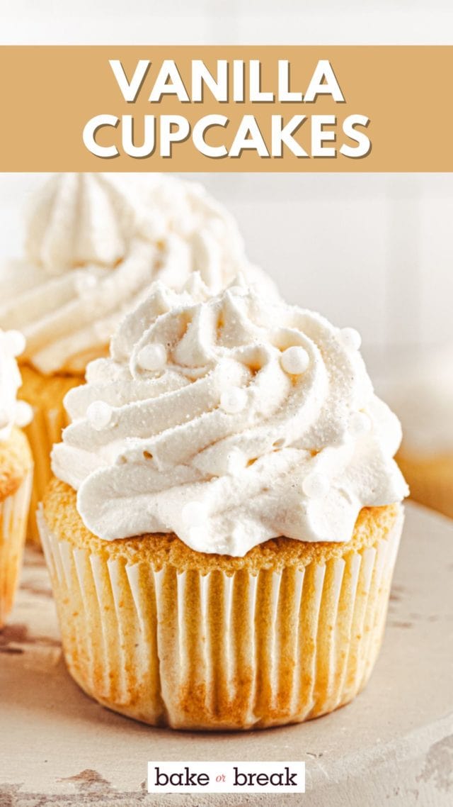 a vanilla cupcake topped with Swiss buttercream and white sprinkles; text overlay "vanilla cupcakes bake or break"
