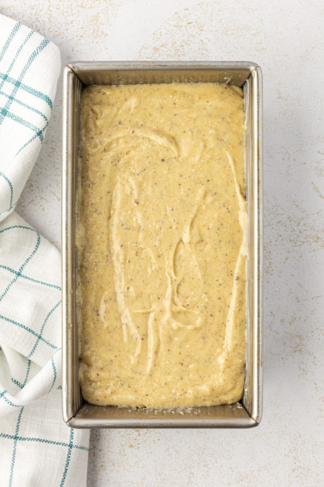 overhead view of brown butter pound cake batter in a loaf pan