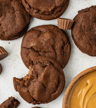overhead view of several chocolate peanut butter cookies on a countertop