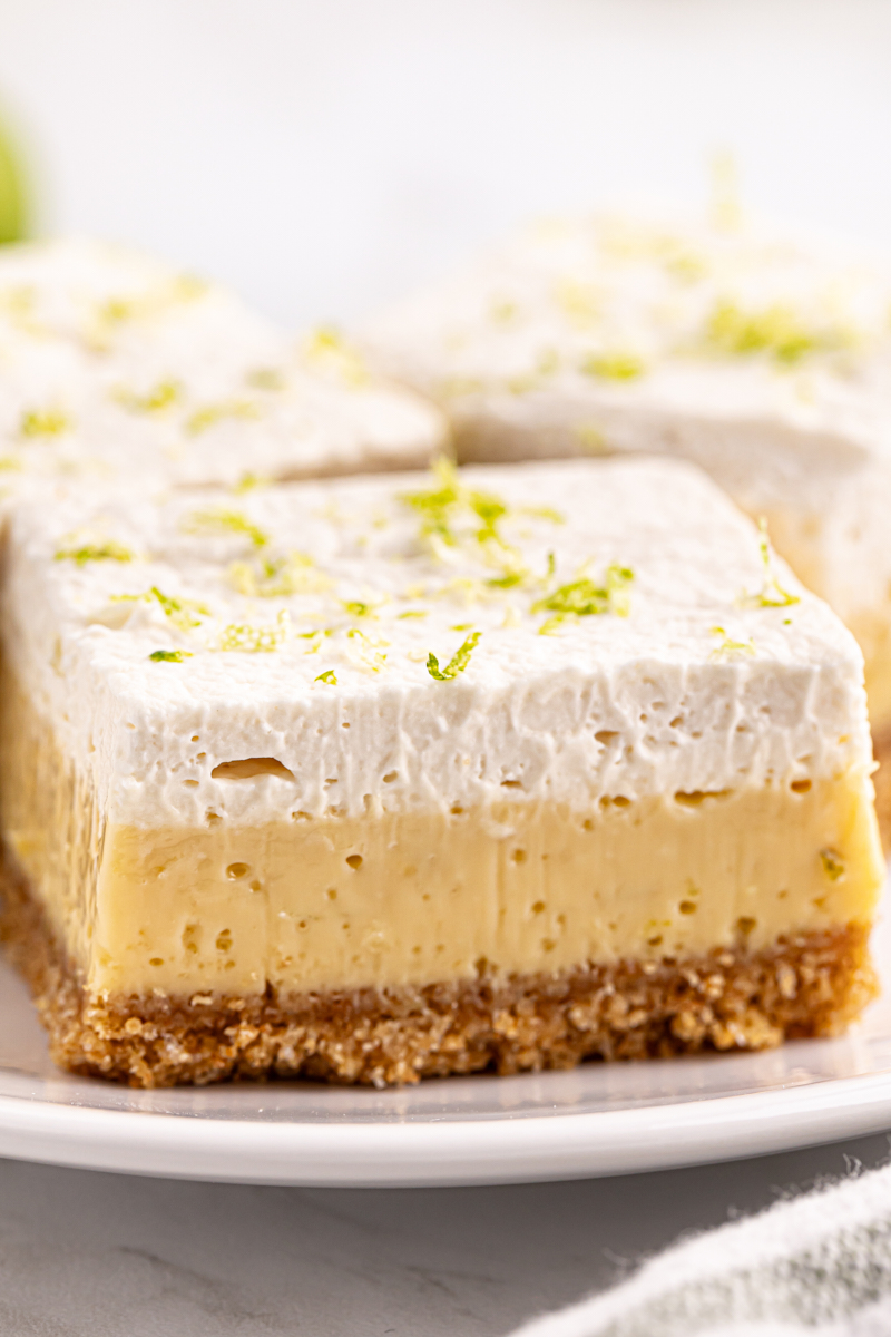 a key lime pie bar on a white plate