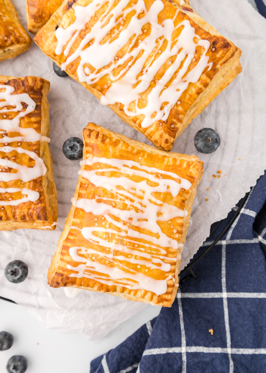 blueberry toaster strudels on parchment paper