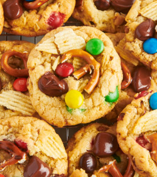 Overhead view of kitchen sink cookies stacked on wire rack