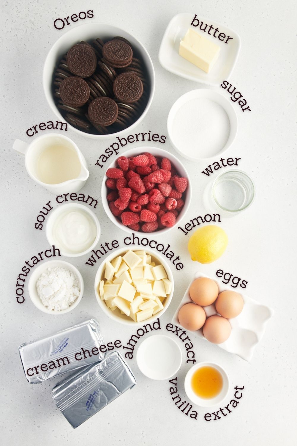 Overhead view of ingredients for white chocolate raspberry cheesecake