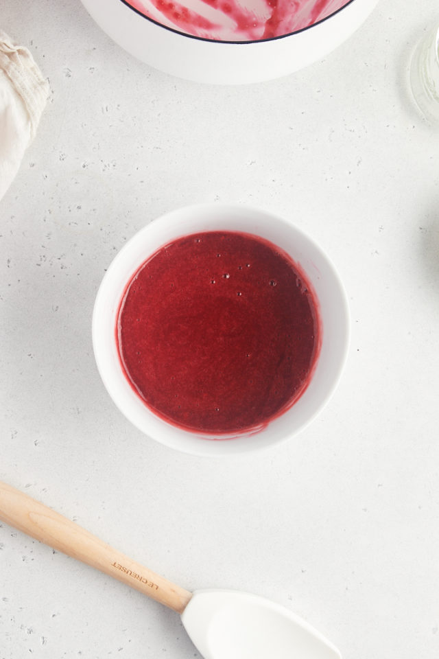 Overhead view of raspberry sauce in bowl