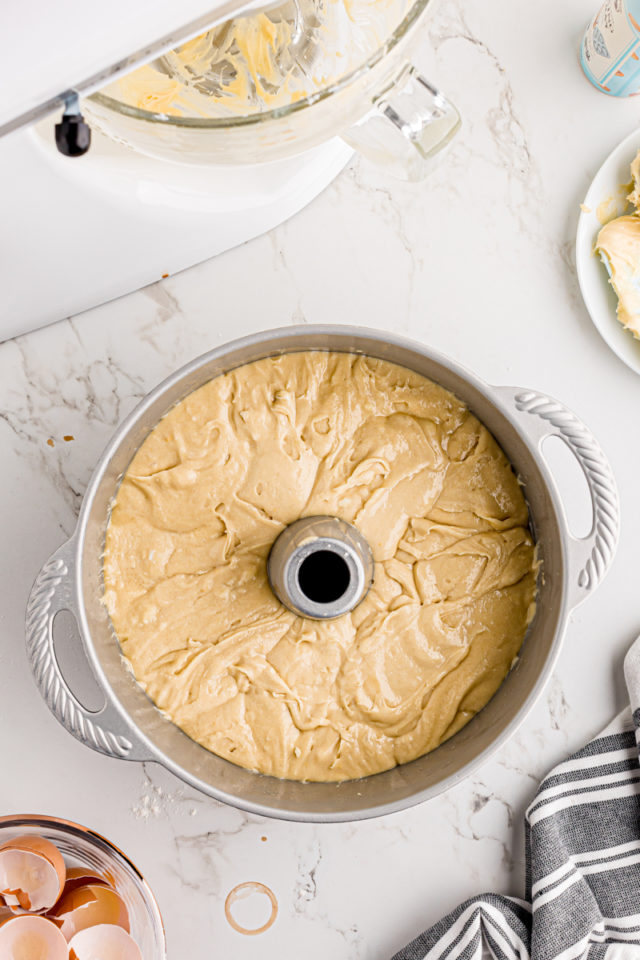 overhead view of cream cheese pound cake batter in a tube pan