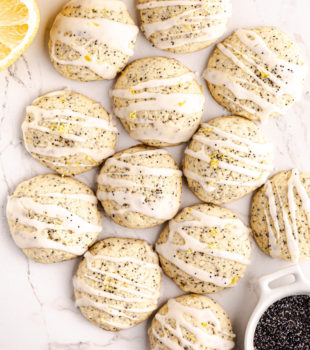 overhead view of lemon poppy seed cookies on a marble countertop