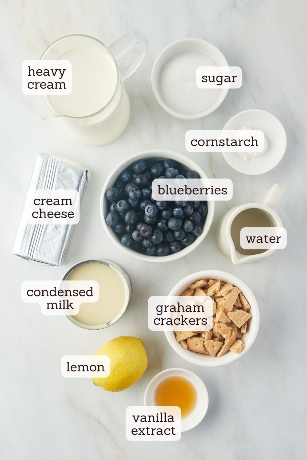 overhead view of ingredients for blueberry cheesecake ice cream