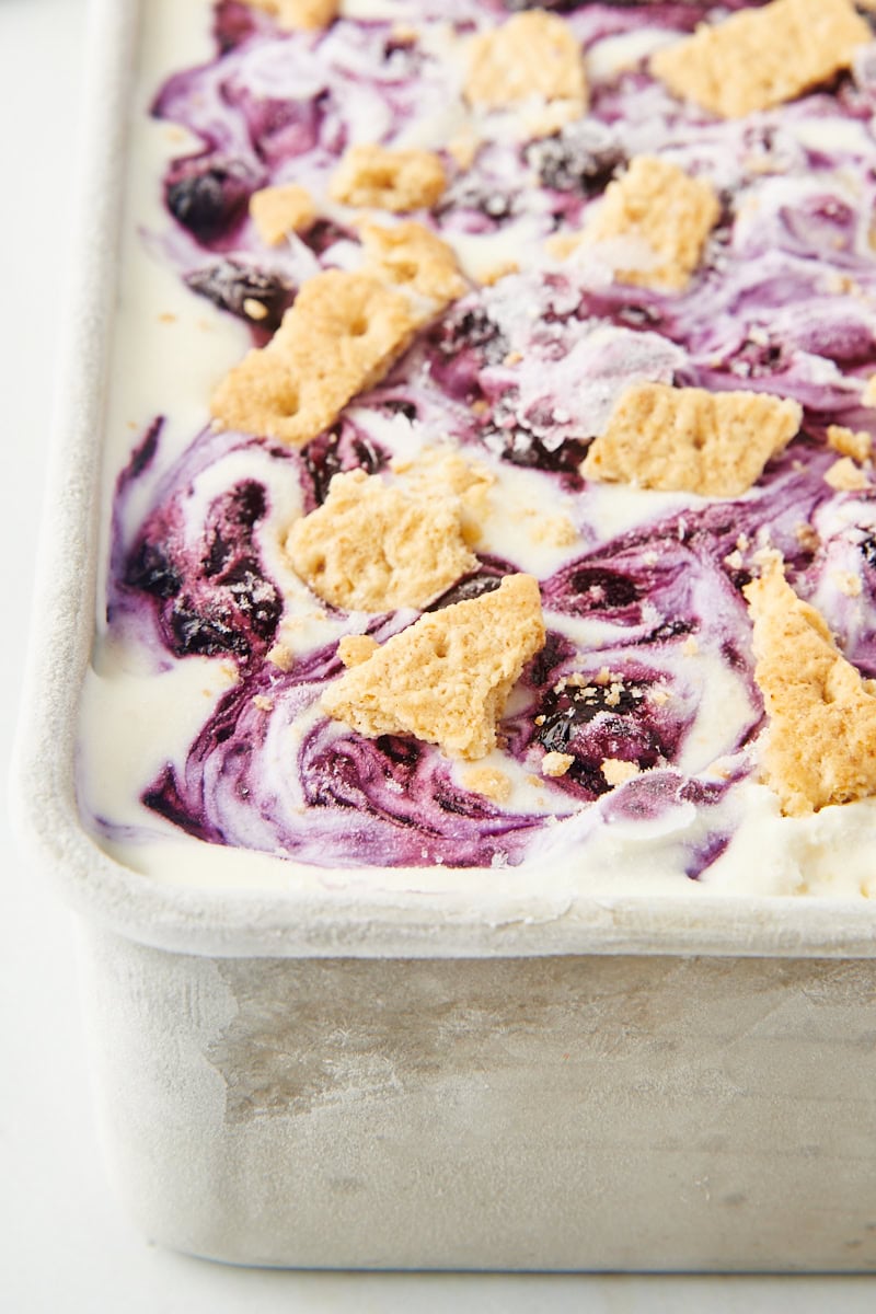 close-up of blueberry cheesecake ice cream in a metal loaf pan