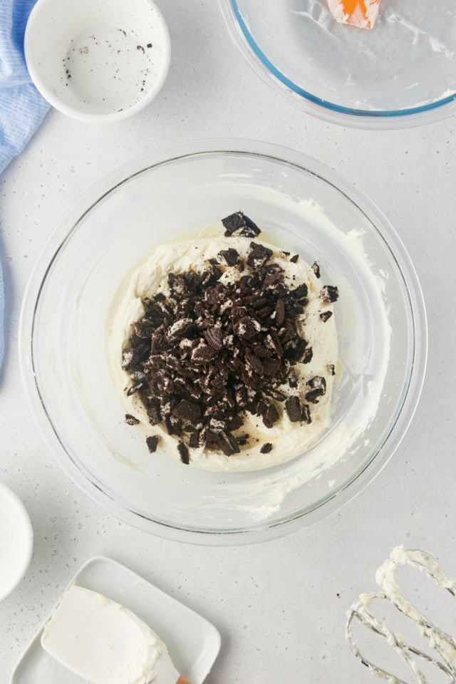 overhead view of chopped Oreos added to filling mixture for Oreo pie