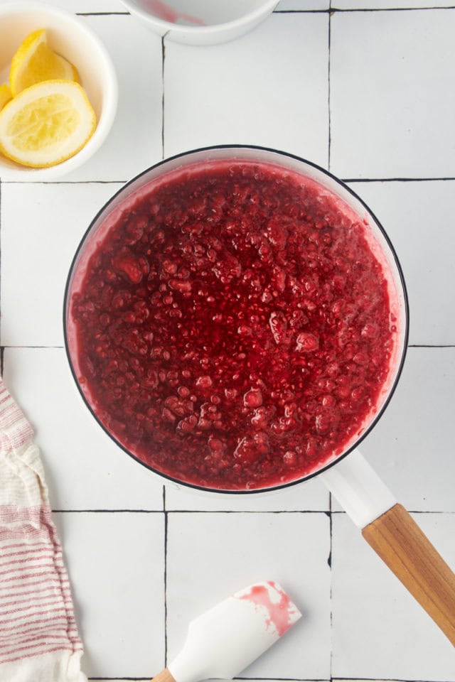 overhead view of cooked raspberry coulis before blending