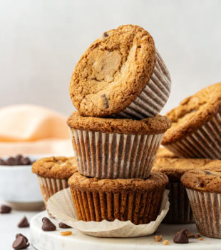 stack of three blondie cupcakes on a marble tray