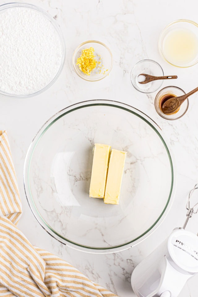 overhead view of butter in a glass mixing bowl