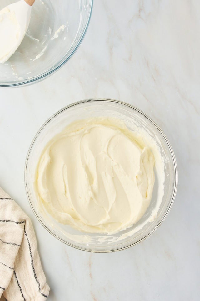 overhead view of mixed s'mores pie filling in a glass mixing bowl