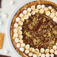 overhead view of s'mores pie in a metal pie pan