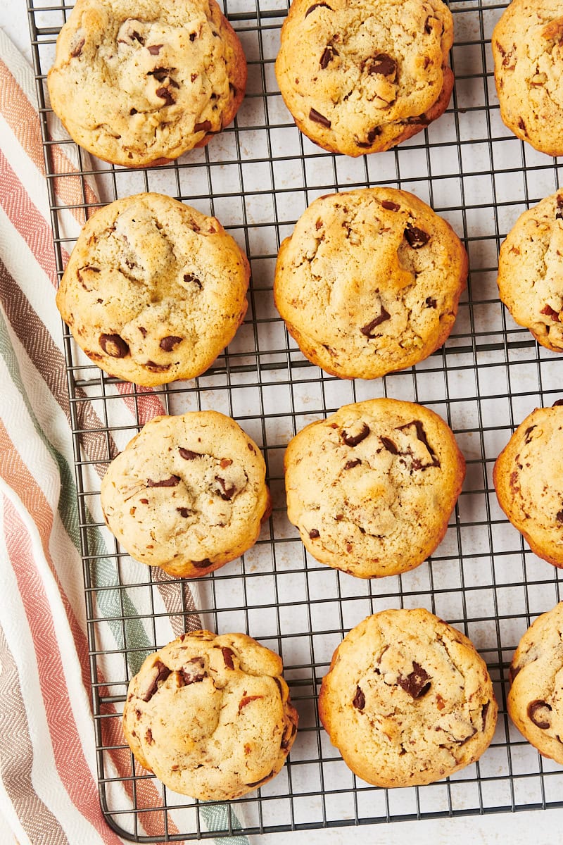 thick chocolate chip cookies on a wire cooling rack