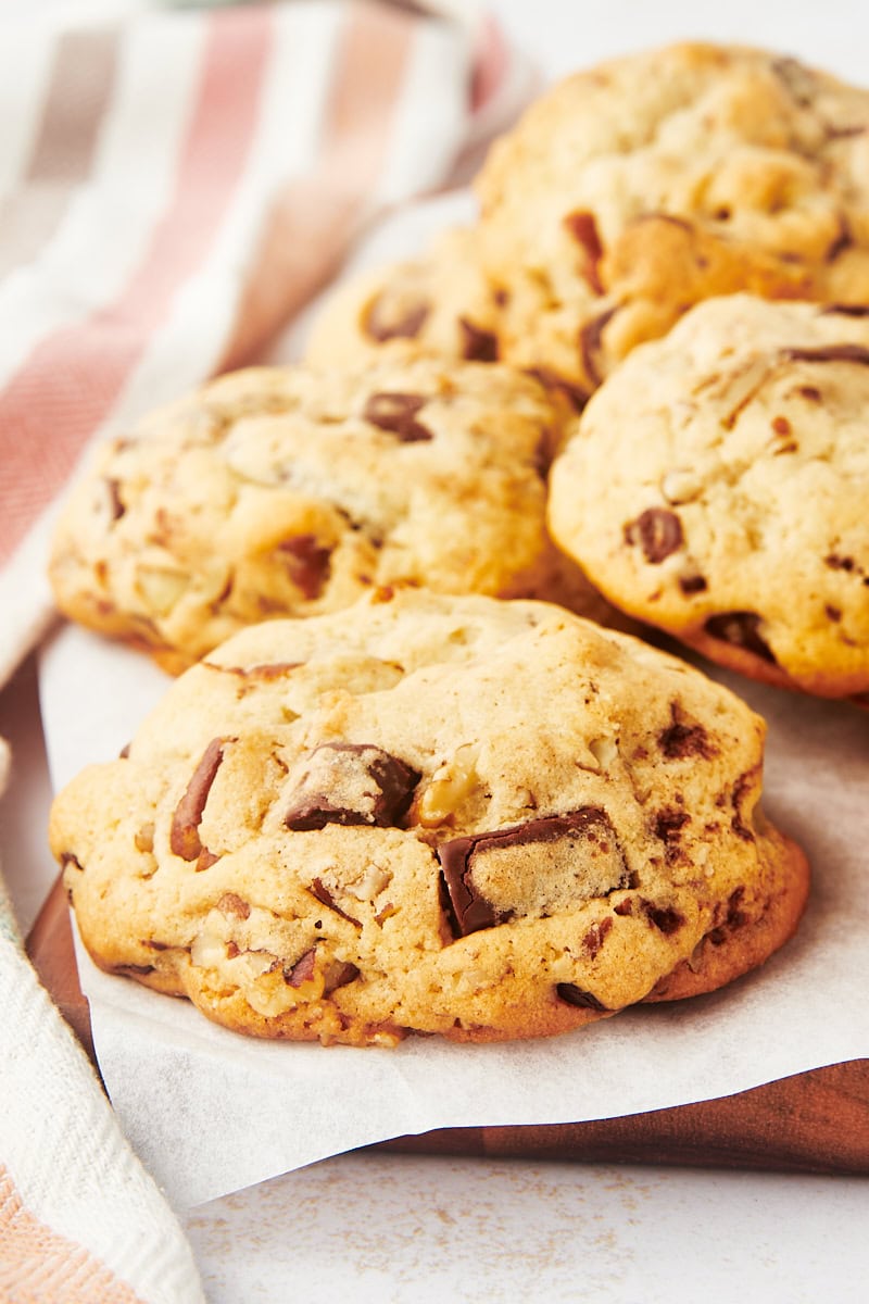 thick chocolate chip cookies on parchment paper