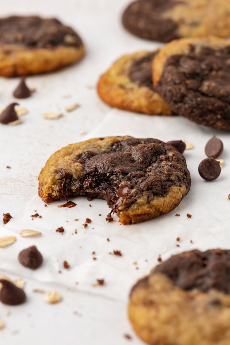 a marbled chocolate chip cookie with a bite missing