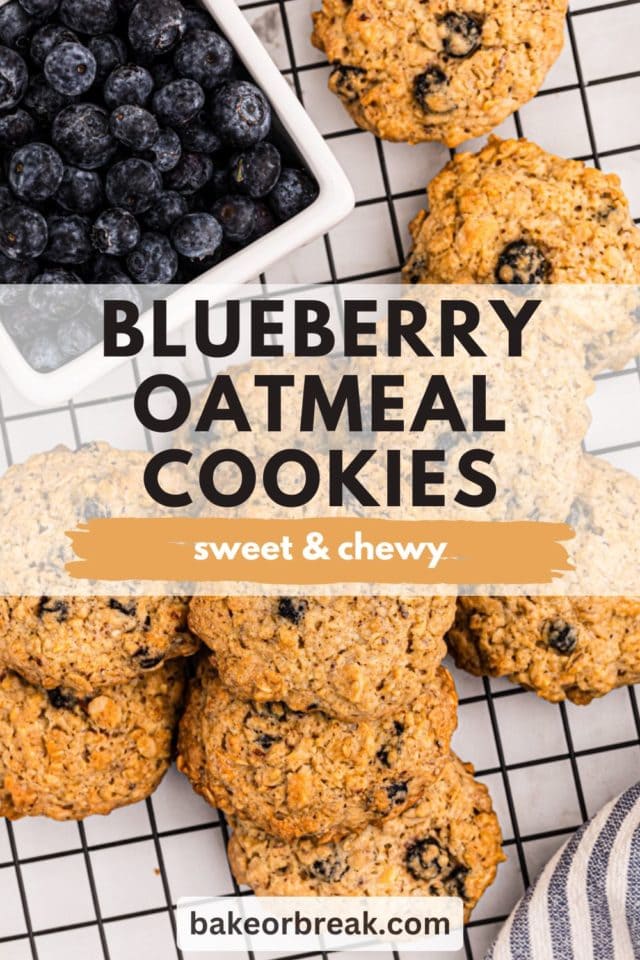 overhead view of blueberry oatmeal cookies on a wire rack along with a container of fresh blueberries; text overlay "blueberry oatmeal cookies sweet & chewy bakeorbreak.com"