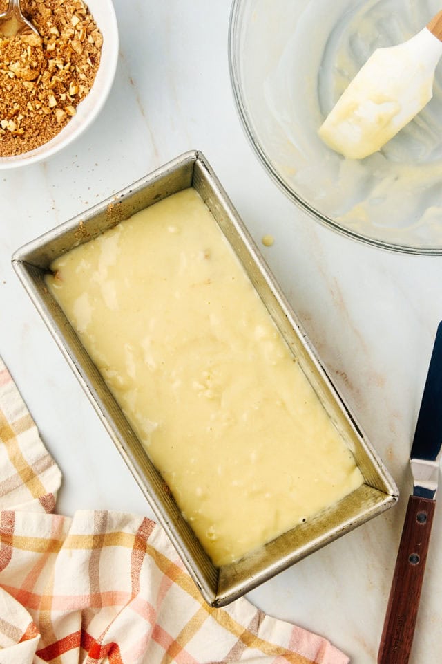 overhead view of remaining cinnamon swirl bread batter layered in a loaf pan