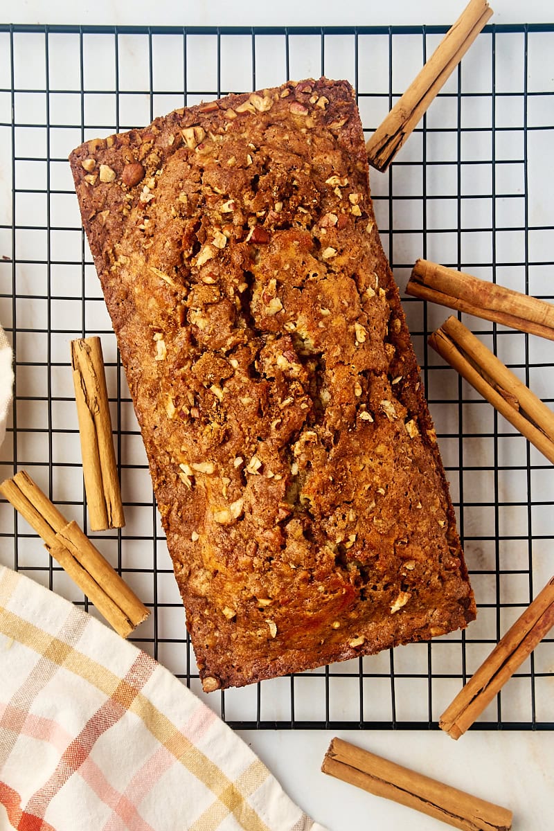 overhead view of cinnamon swirl bread on a wire rack