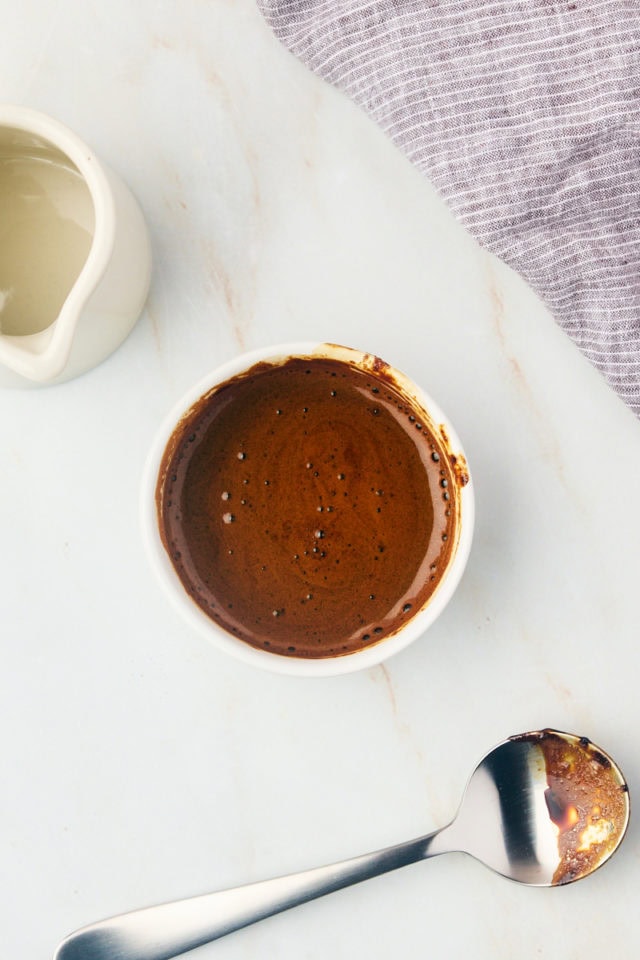 overhead view of espresso powder dissolved in hot water