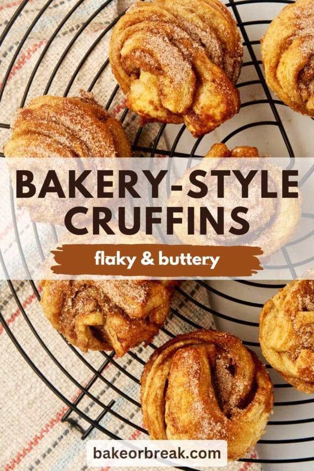 overhead view of cruffins on a wire cooling rack; text overlay "bakery-style cruffins flaky & buttery bakeorbreak.com"