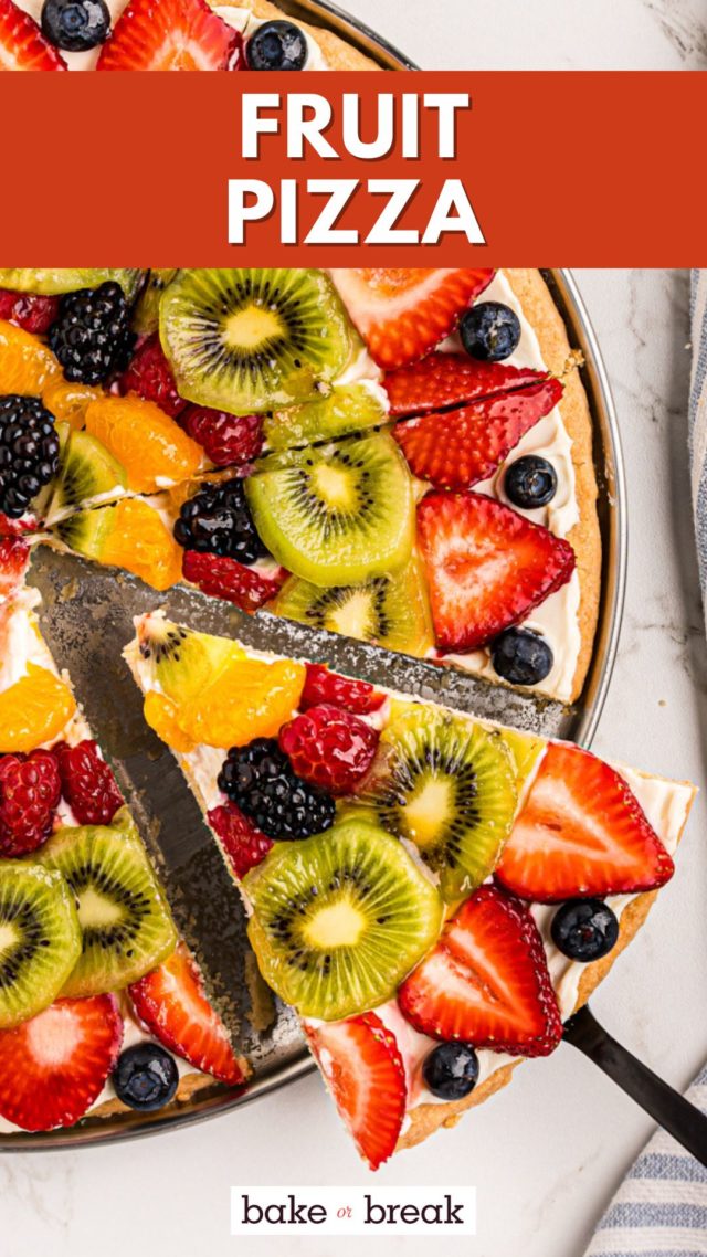 overhead view of a slice of fruit pizza being served from the remaining pizza; text overlay "fruit pizza bake or break"