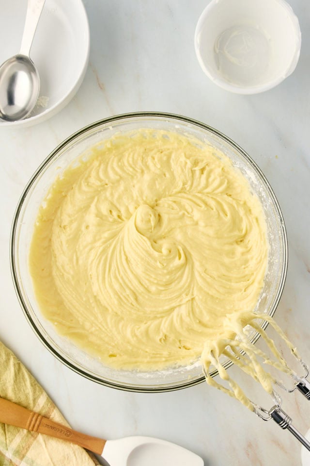 Overhead view of batter for limoncello cake in bowl